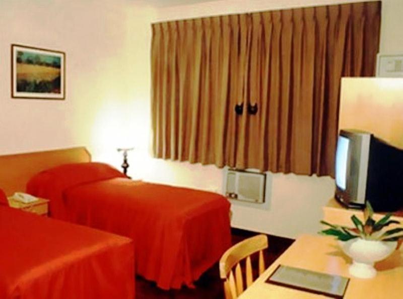 Hotel Gravataí Center Quarto foto