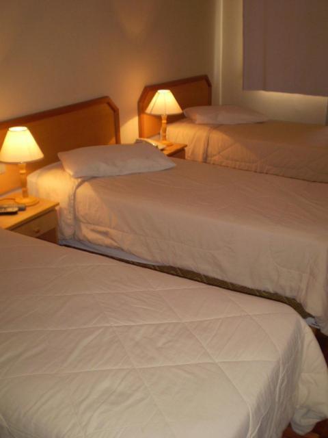 Hotel Gravataí Center Quarto foto